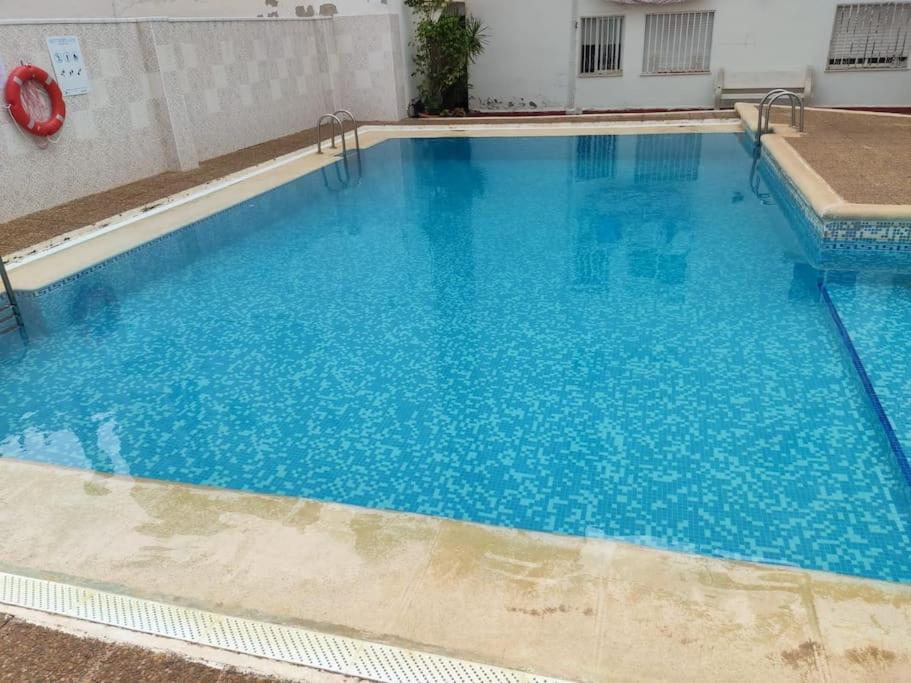 Acogedor Apartamento En La Playa Playa de Gandia Bagian luar foto